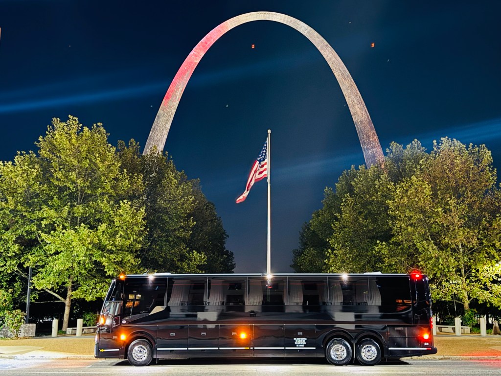 56 passenger upgraded Tour Coach with underfloor storage, Wi-Fi, premium seat amenities, and a restroom on board. 